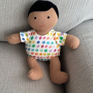 Lovevery organic cotton babydoll in tan